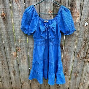 Blush mini dress size large. Tie neckline with tassel ends